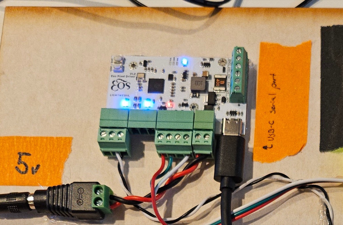 Pixel Driver connected via USB-C with status LEDs lit