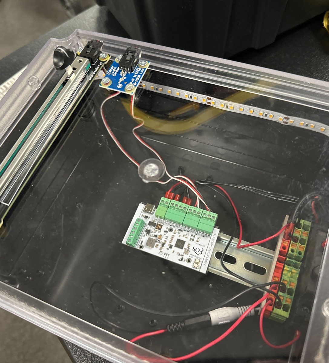 Pixel Driver installed in a clear case driving an LED strip